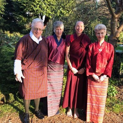 ichard in his Gho, the volunteers in their Kira, and Emma in her nun