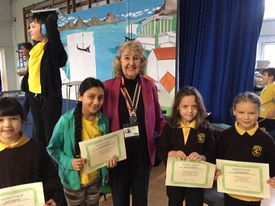 Winners of our Christmas-themed Writing Competition from Blean School with President Margaret Griffin.