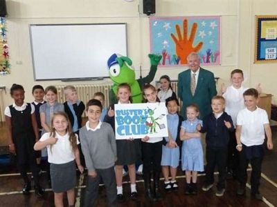 Picture: Harry joins students and mascot 