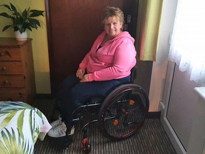 Picture of Stephanie and her new wheelchair