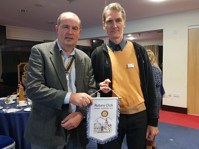 Ulrich presents our President Martin with a pennant at our evening meeting