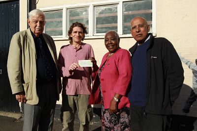 Handing cheque over to Catching Lives