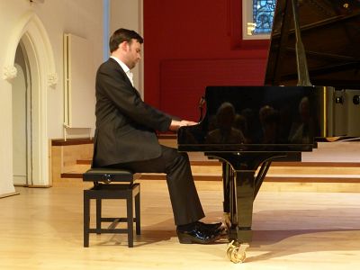 John Ekins several years ago at our recital.