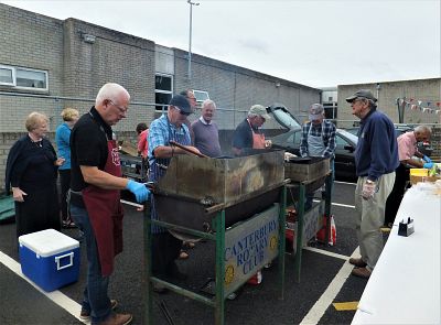 Rotarians hard at work at the barbecue