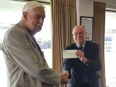 PP and Chair of our Community Services Commitee David Barton hands over the cheque to Derek Fowler from the Canterbury and District Recorder
